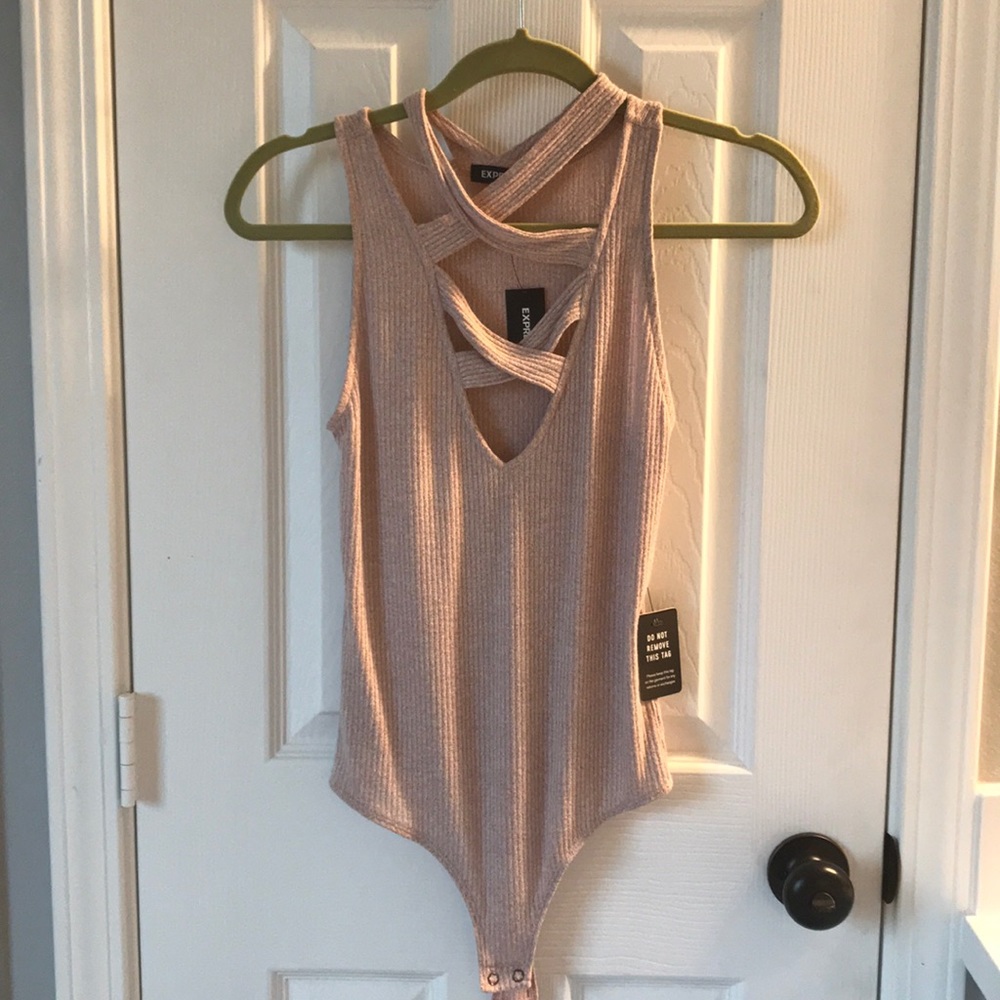 Pink cutout Express bodysuit. Size small. NWT
